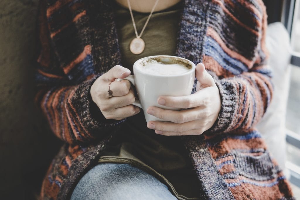 Woman holding a mug of coffee