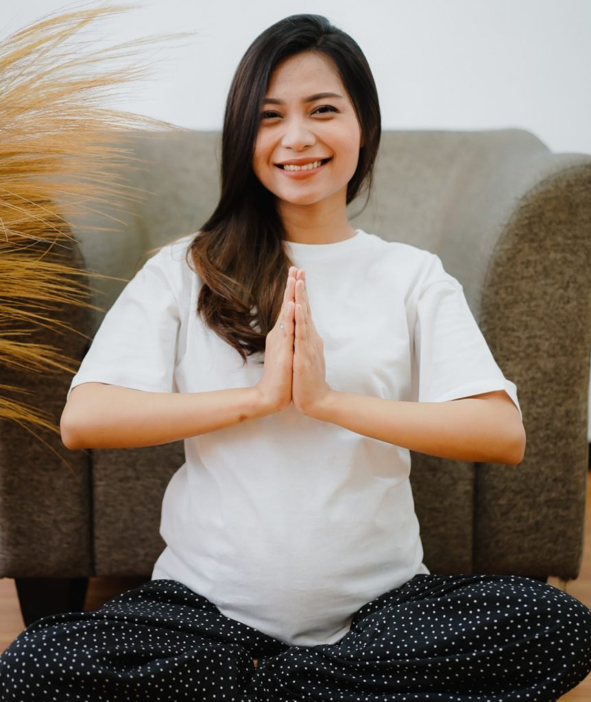 pregnant woman in yoga pose